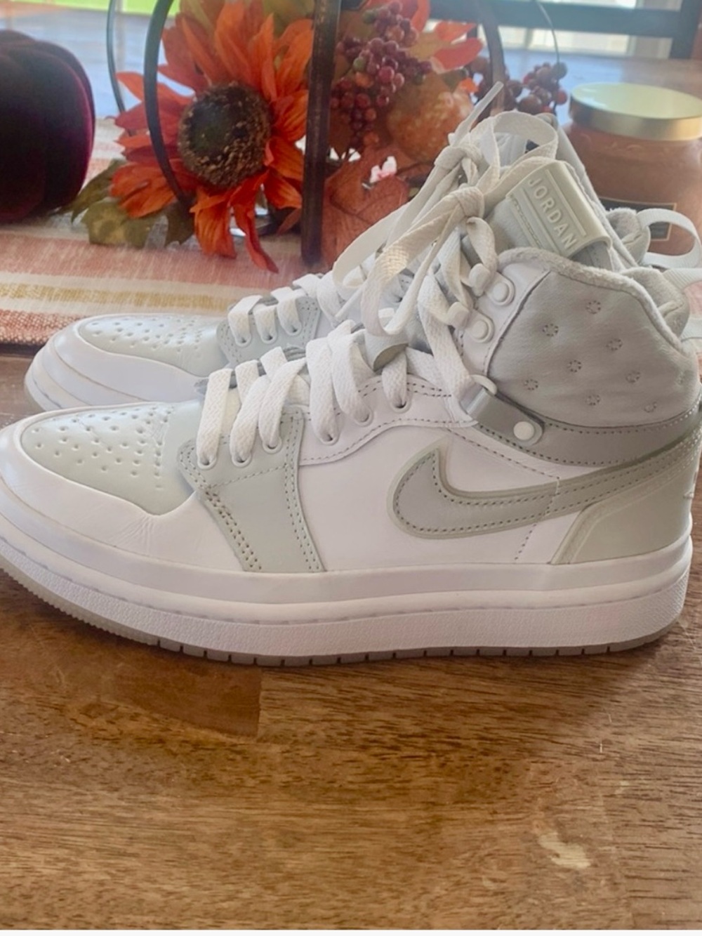 Nike Women's Air Jordan 1 Acclimate sneakers in the "White Grey Fog Photon Dust"